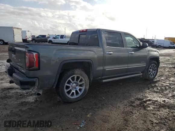 2017 GMC Sierra 1500 Denali with VIN 3GTP1PEJ8HG287682, listed as a Copart auction lot 84727334 with 143,711 mi miles and Salvage title. Bid and sale history available at DreamBid. Image 3.