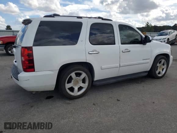 2007 Chevrolet Tahoe LT с VIN 1GNFC13J27R108838, выставлен на аукционе Copart как лот 85270265 с пробегом 265 547 миль миль и Списание • Salvage title. История ставок и продаж доступна на DreamBid. Изображение 3.