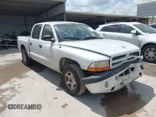 2001 Dodge Dakota Sport with VIN 1B7GL2AX11S138942, listed as a IAAI auction lot 43092446 with 258,961 mi miles and . Bid and sale history available at DreamBid. Image 1.