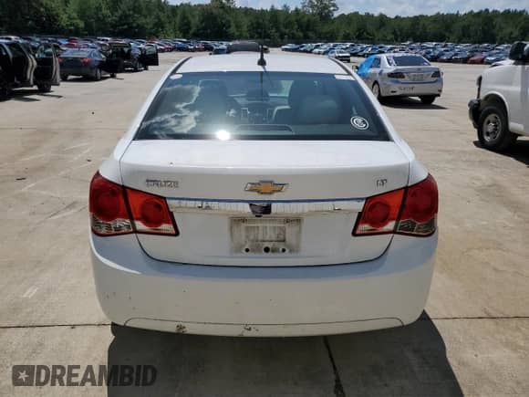 2014 Chevrolet Cruze 2LT с VIN 1G1PE5SB2E7164515, выставлен на аукционе Copart как лот 70232365 с пробегом 118 554 миль миль и Списание • Salvage title. История ставок и продаж доступна на DreamBid. Изображение 6.