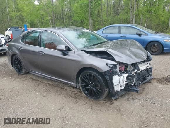 2023 Toyota Camry Hybrid XSE с VIN 4T1K31AK6PU048011, выставлен на аукционе Copart как лот 53983115 с пробегом 195 772 миль миль и Списание • Salvage title. История ставок и продаж доступна на DreamBid. Изображение 4.