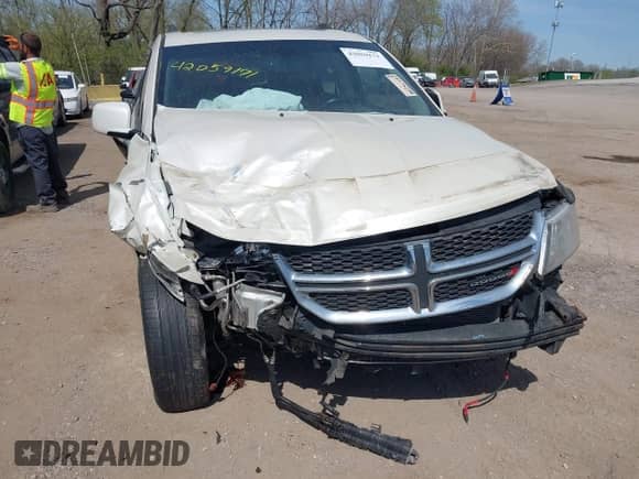 2013 Dodge Journey Crew with VIN 3C4PDDDGXDT590038, listed as a IAAI auction lot 42059171 with 185,632 mi miles and . Bid and sale history available at DreamBid. Image 6.