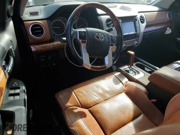 2016 Toyota Tundra Platinum with VIN 5TFGW5F1XGX205613, listed as a Copart auction lot 83857424 with 77,389 mi miles and Salvage title. Bid and sale history available at DreamBid. Image 8.