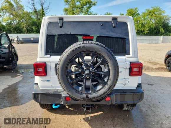 2024 Jeep Wrangler Sahara with VIN 1C4RJXP63RW215504, listed as a Copart auction lot 60795235 with 13,631 mi miles and Salvage title. Bid and sale history available at DreamBid. Image 6.