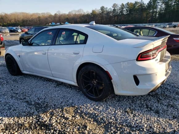 2023 Dodge Charger SRT Hellcat Redeye Widebody with VIN 2C3CDXL92PH630519, listed as a Copart auction lot 83360544 with 12,389 mi miles and Salvage title. Bid and sale history available at DreamBid. Image 2.