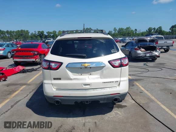 2014 Chevrolet Traverse LTZ с VIN 1GNKRJKD9EJ261768, выставлен на аукционе IAAI как лот 42981681 с пробегом 271 638 миль миль и . История ставок и продаж доступна на DreamBid. Изображение 16.