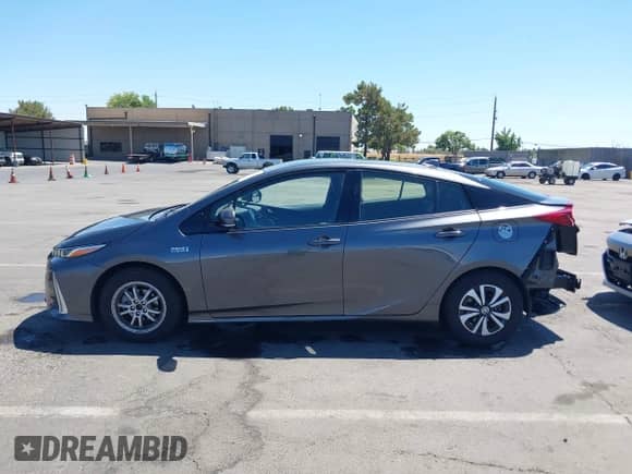 2018 Toyota Prius Plus z VIN JTDKARFP3J3073801, wystawiony jako IAAI lot #42903373 z przebiegiem 90 429 mil mil oraz . Historia ofert i sprzedaży dostępna na DreamBid. Obrazek 15.
