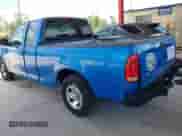 1999 Ford F-150 XL with VIN 1FTRX17L9XNB83680, listed as a IAAI auction lot 42636807 with Not provided miles and . Bid and sale history available at DreamBid. Image 3.