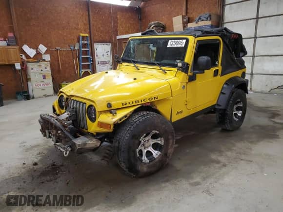 2005 Jeep Wrangler Rubicon with VIN 1J4FA69S05P384188, listed as a Copart auction lot 63390845 with 194,631 mi miles and Salvage title. Bid and sale history available at DreamBid. Image 1.