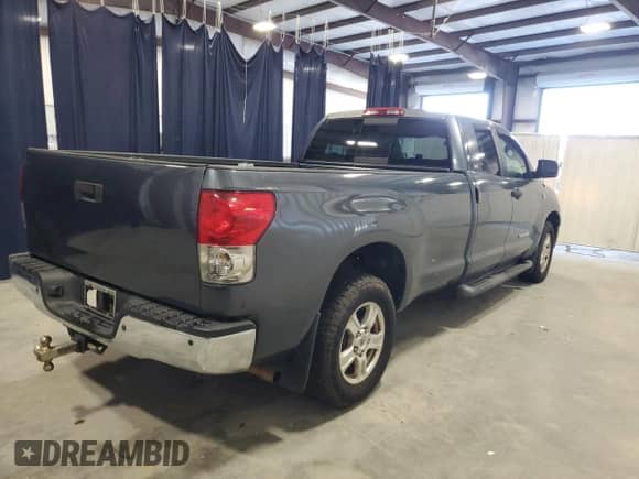 2007 Toyota Tundra SR5 with VIN 5TFST54107X001148, listed as a Copart auction lot 87414295 with 164,327 mi miles and Clean title. Bid and sale history available at DreamBid. Image 3.
