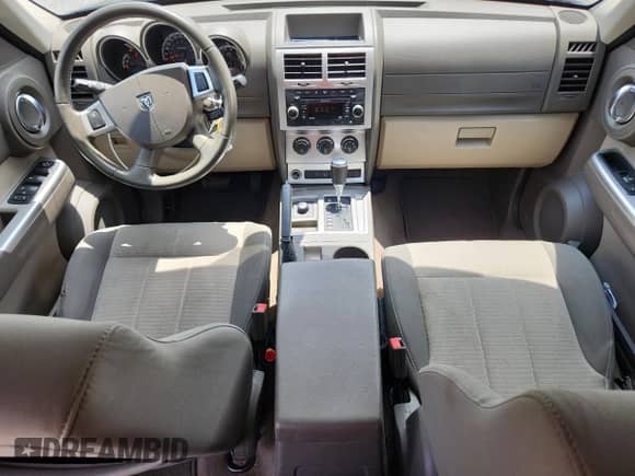 2009 Dodge Nitro SLT with VIN 1D8GU58K49W544504, listed as a Copart auction lot 64194735 with 98,886 mi miles and Salvage title. Bid and sale history available at DreamBid. Image 8.