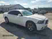 2013 Dodge Charger SE z VIN 2C3CDXBG8DH734850, wystawiony jako Copart lot #84279015 z przebiegiem 239 305 mil mil oraz Czysty tytuł • Clean title. Historia ofert i sprzedaży dostępna na DreamBid. Obrazek 4.