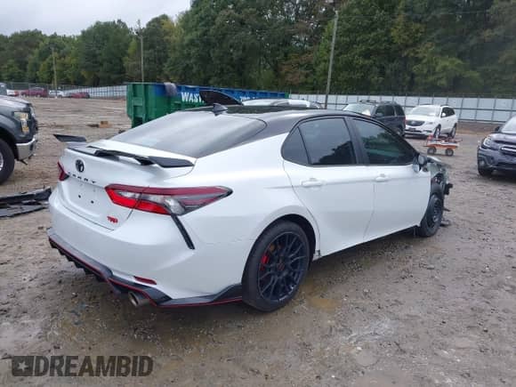 2023 Toyota Camry TRD with VIN 4T1KZ1AKXPU082161, listed as a IAAI auction lot 43388188 with 42,868 mi miles and . Bid and sale history available at DreamBid. Image 4.