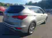 2017 Hyundai Santa Fe 2.4L z VIN 5XYZTDLBXHG441059, wystawiony jako IAAI lot #43284375 z przebiegiem 130 841 mil mil oraz . Historia ofert i sprzedaży dostępna na DreamBid. Obrazek 4.