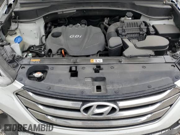 2013 Hyundai Santa Fe Sport z VIN 5XYZU3LBXDG114775, wystawiony jako Copart lot #58007985 z przebiegiem 124 807 mil mil oraz Szkoda całkowita • Salvage title. Historia ofert i sprzedaży dostępna na DreamBid. Obrazek 12.