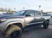 2021 Toyota Tacoma SR5 z VIN 3TMDZ5BN2MM108586, wystawiony jako IAAI lot #41604953 z przebiegiem 65 422 mil mil oraz . Historia ofert i sprzedaży dostępna na DreamBid. Obrazek 14.