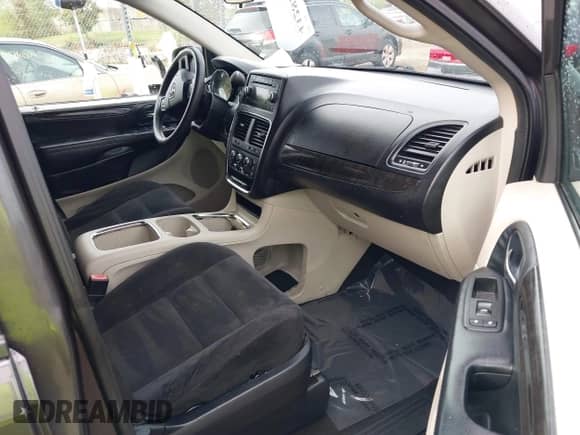 2015 Dodge Grand Caravan SXT with VIN 2C4RDGCG5FR541105, listed as a IAAI auction lot 43282570 with 176,921 mi miles and . Bid and sale history available at DreamBid. Image 5.