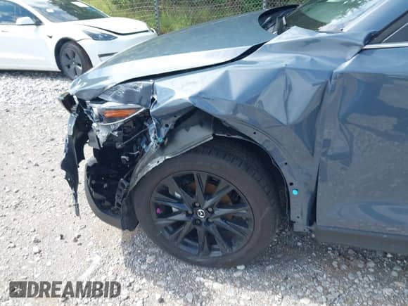 2025 Mazda CX-5 S Carbon Edition z VIN JM3KFBCM8S0646821, wystawiony jako IAAI lot #42610837 z przebiegiem Nie podano mil oraz . Historia ofert i sprzedaży dostępna na DreamBid. Obrazek 6.