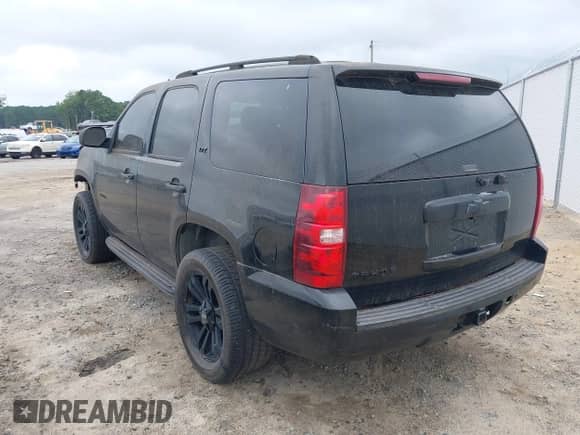 2007 Chevrolet Tahoe LTZ with VIN 1GNFK13087R199124, listed as a IAAI auction lot 42898579 with 252,212 mi miles and . Bid and sale history available at DreamBid. Image 3.