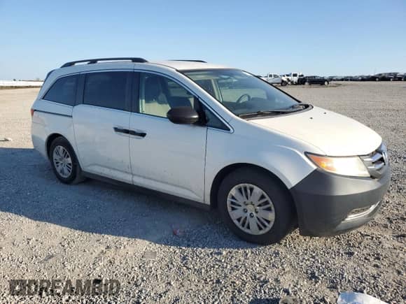 2014 Honda Odyssey LX with VIN 5FNRL5H29EB094020, listed as a Copart auction lot 85722415 with 217,186 mi miles and Clean title. Bid and sale history available at DreamBid. Image 4.