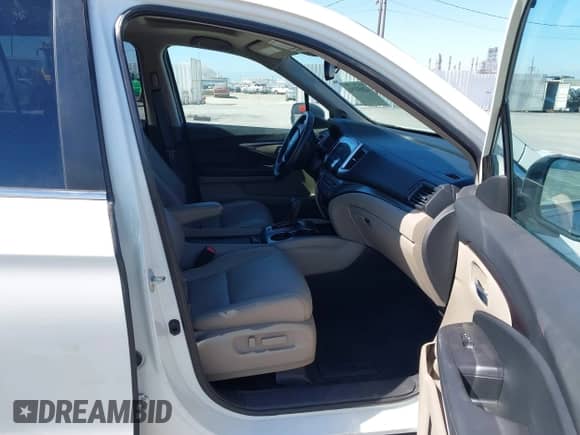 2018 Honda Pilot EX-L with VIN 5FNYF5H52JB026830, listed as a IAAI auction lot 42853756 with 15,305 mi miles and . Bid and sale history available at DreamBid. Image 5.