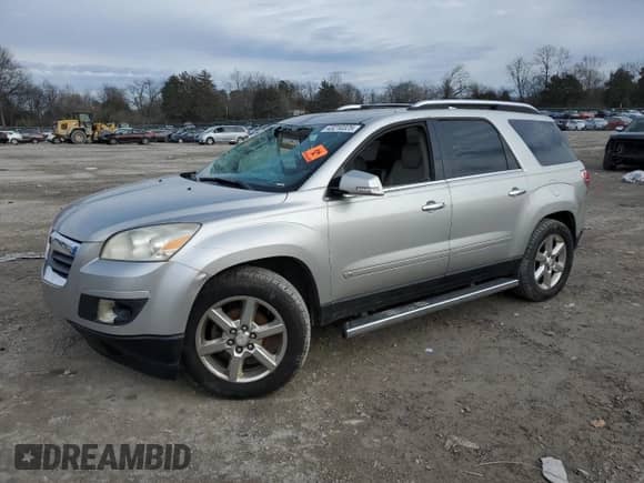 2007 Saturn Outlook XR with VIN 5GZER337X7J174960, listed as a Copart auction lot 43210325 with 170,782 mi miles and Salvage title. Bid and sale history available at DreamBid. Image 1.