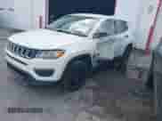 2018 Jeep Compass Sport with VIN 3C4NJCAB5JT263450, listed as a IAAI auction lot 42288257 with 115,860 mi miles and . Bid and sale history available at DreamBid. Image 2.