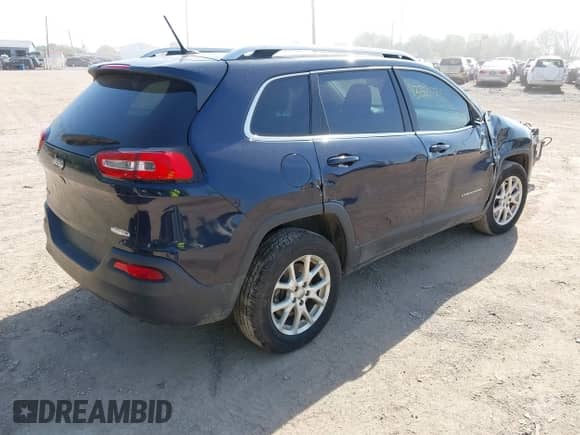 2014 Jeep Cherokee Latitude with VIN 1C4PJMCS0EW197448, listed as a IAAI auction lot 43325751 with 223,473 mi miles and . Bid and sale history available at DreamBid. Image 4.