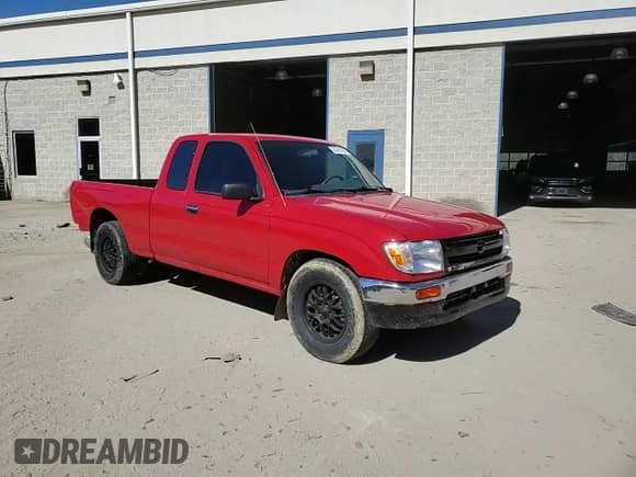 1997 Toyota Tacoma z VIN 4TAVL52N6VZ291508, wystawiony jako Copart lot #82747565 z przebiegiem 233 670 mil mil oraz Szkoda całkowita • Salvage title. Historia ofert i sprzedaży dostępna na DreamBid. Obrazek 13.