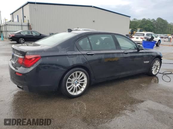 2014 BMW 7 Series 740Li with VIN WBAYE4C51ED138260, listed as a Copart auction lot 53299125 with 87,724 mi miles and Salvage title. Bid and sale history available at DreamBid. Image 3.