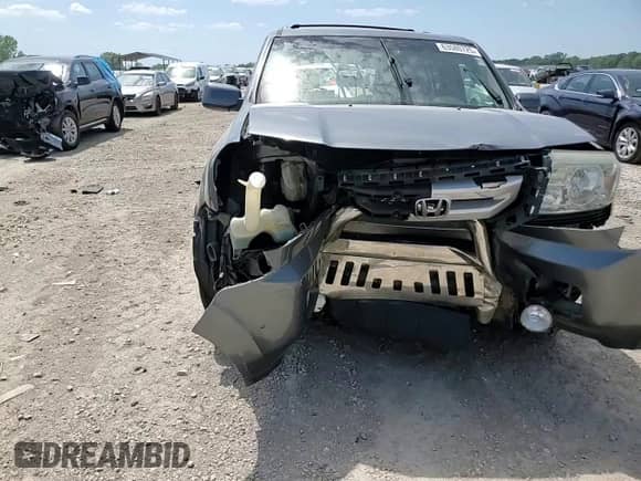 2009 Honda Pilot EX with VIN 5FNYF48429B000869, listed as a Copart auction lot 63580725 with Not provided miles and Salvage title. Bid and sale history available at DreamBid. Image 14.