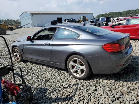 2014 BMW 4 Series 428i xDrive with VIN WBA3N9C56EF721029, listed as a Copart auction lot 66459585 with 123,340 mi miles and Salvage title. Bid and sale history available at DreamBid. Image 2.