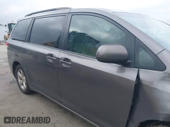 2014 Toyota Sienna LE AAS with VIN 5TDKK3DC2ES459012, listed as a IAAI auction lot 43038989 with 330,758 mi miles and . Bid and sale history available at DreamBid. Image 14.