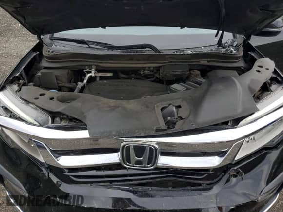 2021 Honda Pilot Touring 8-Passenger с VIN 5FNYF6H95MB045000, выставлен на аукционе Copart как лот 67716375 с пробегом 101 660 миль миль и Списание • Salvage title. История ставок и продаж доступна на DreamBid. Изображение 12.