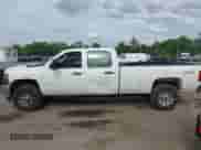 2013 Chevrolet Silverado 2500HD Work Truck z VIN 1GC1KVC85DF201179, wystawiony jako IAAI lot #42210565 z przebiegiem 236 384 mil mil oraz . Historia ofert i sprzedaży dostępna na DreamBid. Obrazek 14.