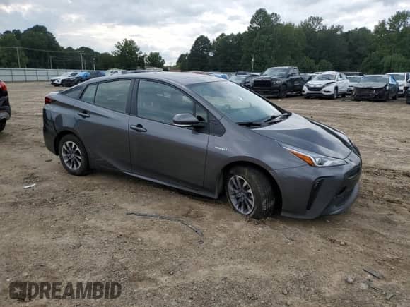 2021 Toyota Prius Limited with VIN JTDKAMFU9M3148580, listed as a Copart auction lot 82145025 with 64,877 mi miles and Salvage title. Bid and sale history available at DreamBid. Image 4.