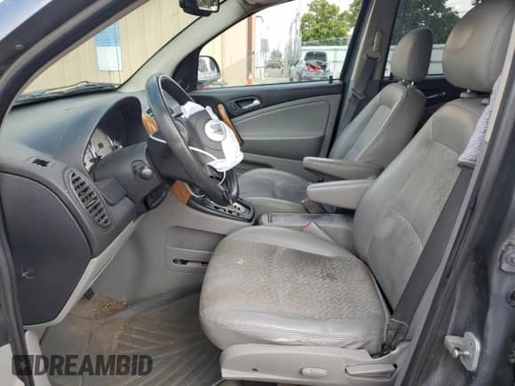 2007 Saturn VUE V6 z VIN 5GZCZ53447S812509, wystawiony jako Copart lot #70159725 z przebiegiem 226 863 mil mil oraz Szkoda całkowita • Salvage title. Historia ofert i sprzedaży dostępna na DreamBid. Obrazek 7.