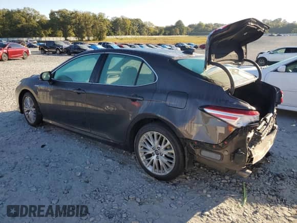 2020 Toyota Camry Hybrid XLE with VIN 4T1F31AK7LU525329, listed as a Copart auction lot 75832114 with 76,763 mi miles and Salvage title. Bid and sale history available at DreamBid. Image 2.