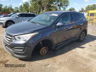 2015 Hyundai Santa Fe with VIN 5XYZTDLB6FG252678, listed as a Copart auction lot 71965325 with 143,121 mi miles and Salvage title. Bid and sale history available at DreamBid. Image 1.