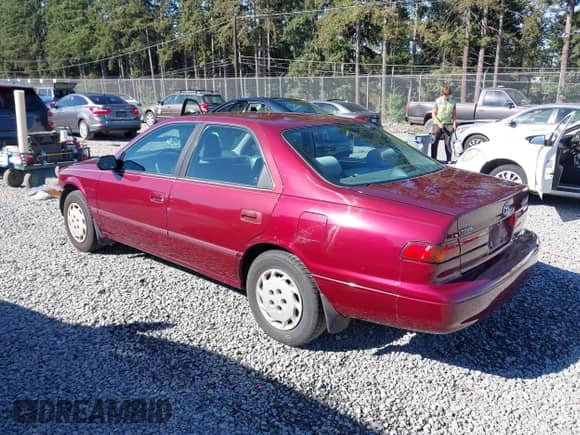 1998 Toyota Camry LE with VIN JT2BG22K8W0143536, listed as a IAAI auction lot 43056659 with 213,728 mi miles and . Bid and sale history available at DreamBid. Image 3.