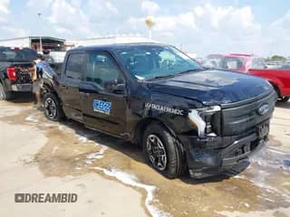 2023 Ford F-150 Lightning Pro with VIN 1FTVW1EL8PWG57567, listed as a IAAI auction lot 43215523 with 61,070 mi miles and . Bid and sale history available at DreamBid. Image 1.