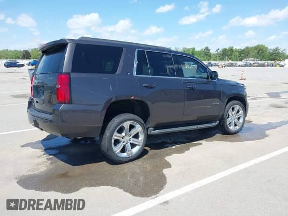 2016 Chevrolet Tahoe LT with VIN 1GNSKBKC3GR427093, listed as a IAAI auction lot 42247317 with 159,352 mi miles and . Bid and sale history available at DreamBid. Image 4.