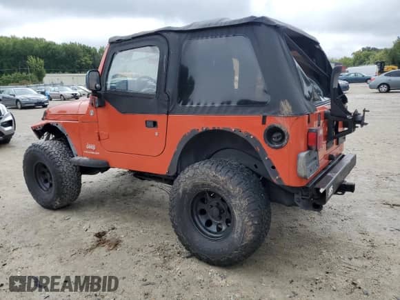 2005 Jeep Wrangler SE z VIN 1J4FA29S75P377103, wystawiony jako Copart lot #80910055 z przebiegiem 103 803 mil mil oraz Szkoda całkowita • Salvage title. Historia ofert i sprzedaży dostępna na DreamBid. Obrazek 2.
