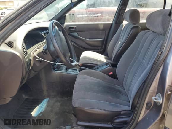 1995 Toyota Camry DX z VIN 4T1SK11E8SU476166, wystawiony jako Copart lot #67434345 z przebiegiem 205 053 mil mil oraz Czysty tytuł • Clean title. Historia ofert i sprzedaży dostępna na DreamBid. Obrazek 7.