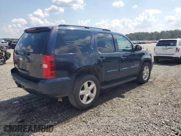 2007 Chevrolet Tahoe LS z VIN 1GNFC13057J122237, wystawiony jako Copart lot #81049025 z przebiegiem 310 096 mil mil oraz Szkoda całkowita • Salvage title. Historia ofert i sprzedaży dostępna na DreamBid. Obrazek 3.
