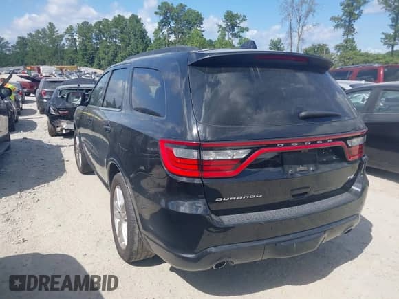 2023 Dodge Durango Hemi Orange with VIN 1C4SDHCT0PC635715, listed as a IAAI auction lot 42943681 with 50,044 mi miles and . Bid and sale history available at DreamBid. Image 3.