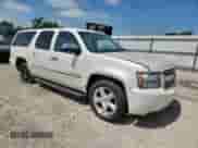 2012 Chevrolet Suburban LTZ with VIN 1GNSKKE7XCR106323, listed as a Copart auction lot 60630435 with 172,978 mi miles and Salvage title. Bid and sale history available at DreamBid. Image 4.