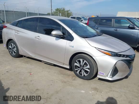 2018 Toyota Prius Plus z VIN JTDKARFP7J3099284, wystawiony jako IAAI lot #42920662 z przebiegiem 51 694 mil mil oraz . Historia ofert i sprzedaży dostępna na DreamBid. Obrazek 1.