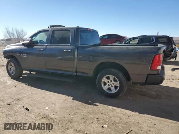 2016 Ram 1500 Tradesman with VIN 1C6RR6ST6GS382807, listed as a Copart auction lot 84349984 with 141,058 mi miles and Salvage title. Bid and sale history available at DreamBid. Image 2.