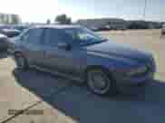 2001 BMW 5 Series 540i с VIN WBADN53421GC96565, выставлен на аукционе Copart как лот 83236524 с пробегом 149 650 миль миль и Списание • Salvage title. История ставок и продаж доступна на DreamBid. Изображение 4.